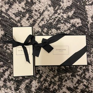 2 empty Jo Malone boxes with ribbon.